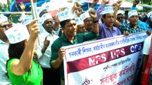 State Govt employees staging a protest  against NPS at Chachal in Guwahati on 24-03-25.Pix by UB Photos